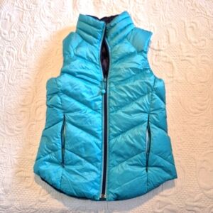 Ivivva girls size 10 reversible down puffer vest teal/navy blue has pockets EUC